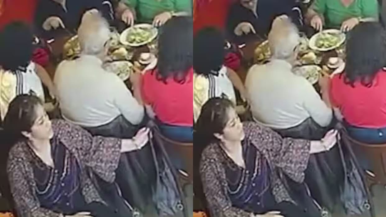 A woman was eating in a restaurant when a woman sitting behind her stole her purse all recorded on CCTV