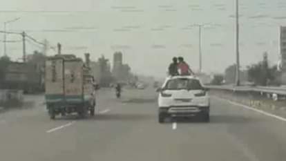 Dangerous stunt in Jalandhar Children seen hanging out of car sunroof for 15 km