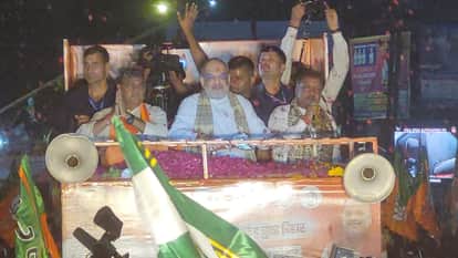 Bihar Election: Union Home Minister Amit Shah roadshow in Purnia, flowers showered from rooftops