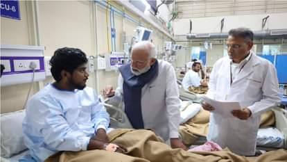 PM Modi meets survivors says those behind conspiracy to be brought to justice