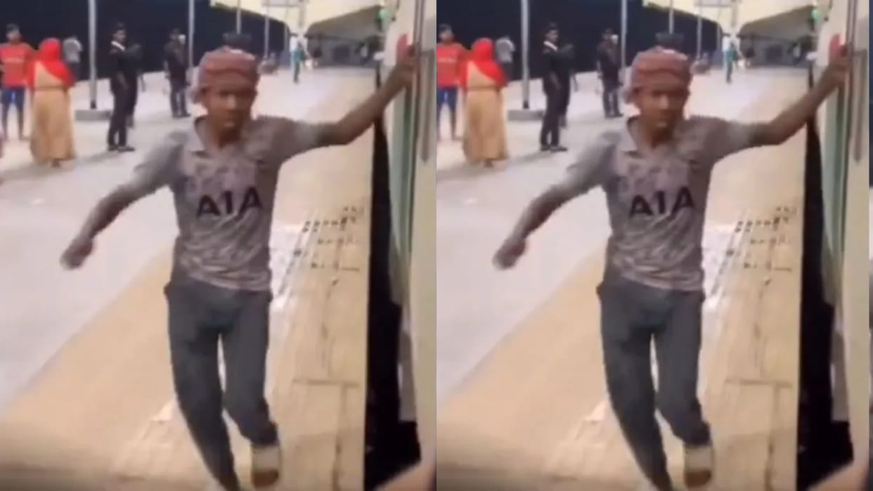 Boy chases moving train does not get paid for his hard work anger erupts Video goes Viral on Internet