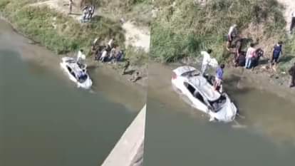 A speeding car broke through a bridge railing and fell 70 feet into a river.