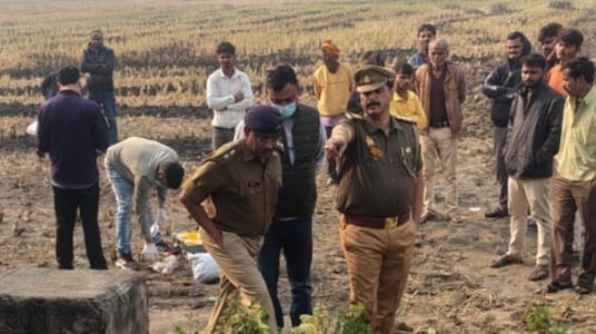 Etawah body of young man was found lying near culvert his head and face crushed and his father alleged murder