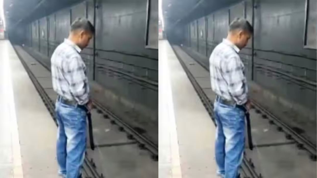 A shameful scene in the Delhi Metro a young man was seen urinating on the platform Video goes Viral