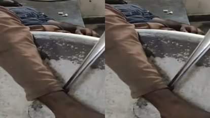 Watchman found sleeping with his feet in a rice pot causing commotion in college hostel Video goes Viral