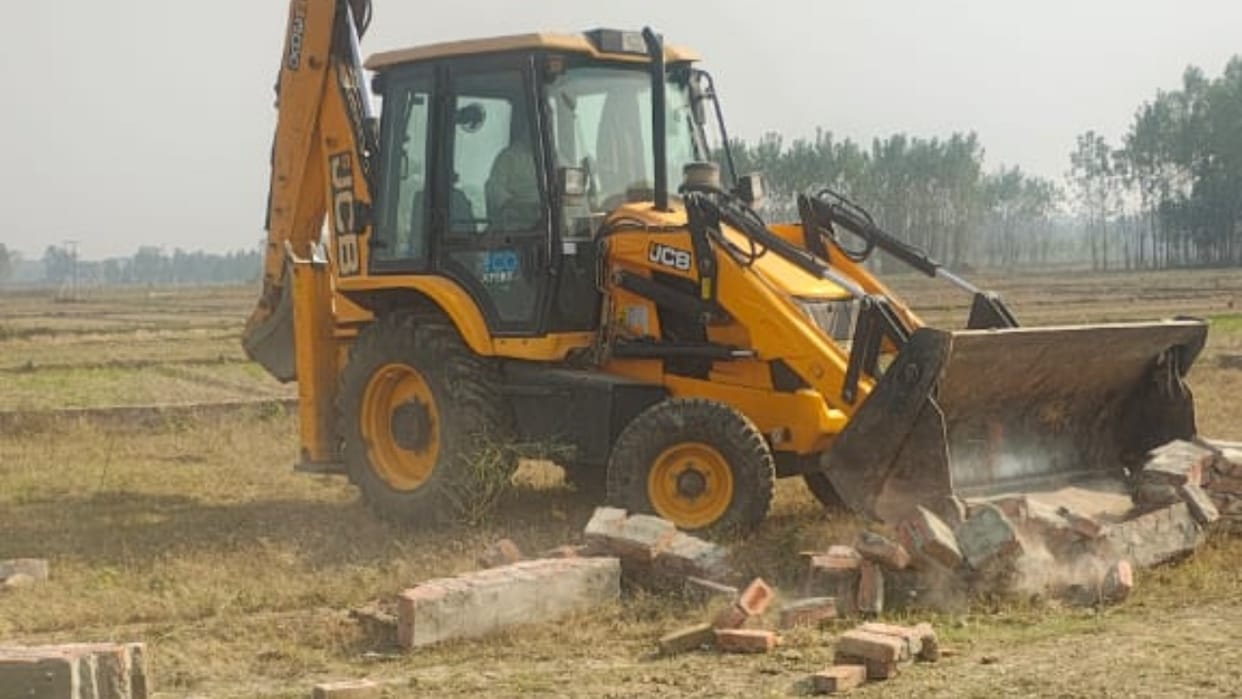 BDA bulldozer runs on SP leader illegal colony in Bareilly