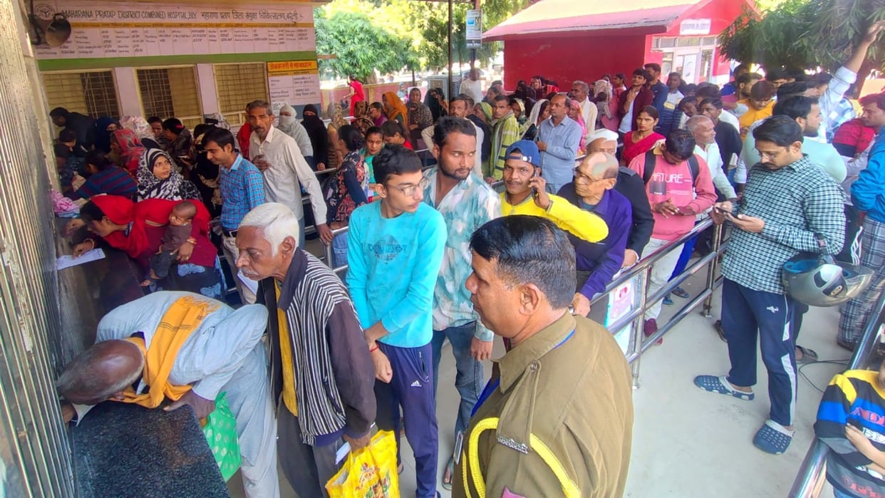 crowd of patients gathered at the district hospital scuffle for medicine in Bareilly