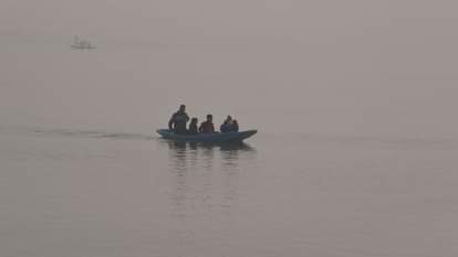 Shikaras were seen moving amidst the morning fog at the famous Dal Lake.