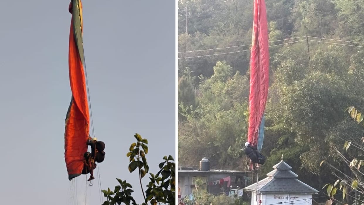 Himachal Dharamshala Paraglider pilot hangs from HT line with tourist for three hours