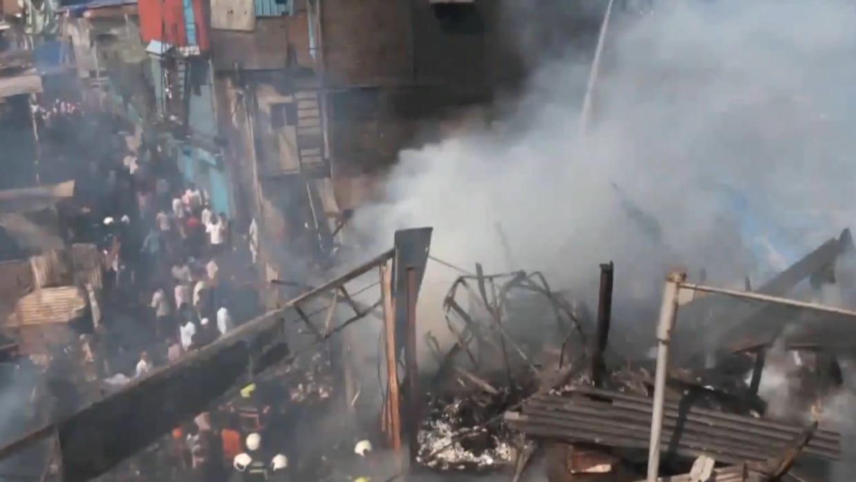 Mumbai Fire Harbour line train tracks Major fire blaze in huts Bandra Mahim services suspended