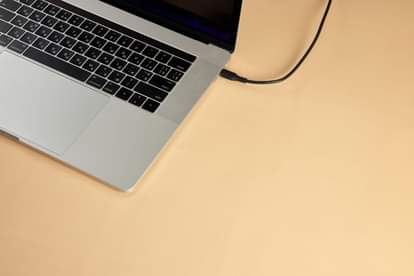 Using  laptop   bed can be costly  Learn about 5 dangerous mistakes  can lead  huge expenses