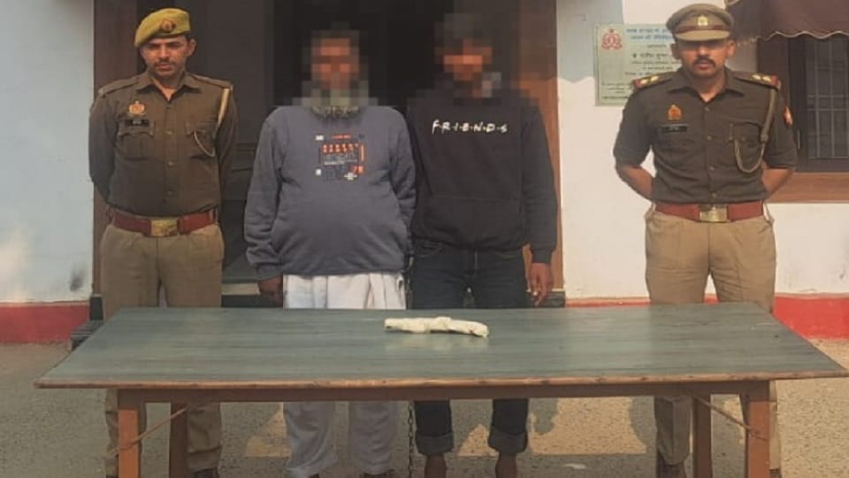 Wanted father and son arrested with pistols and cartridges