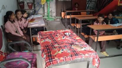 Children searching for teachers and teachers searching for voters monitors taking classes in varanasi