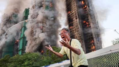 Fire rages through bamboo scaffolding at Hong Kong high-rise residential complex, several died