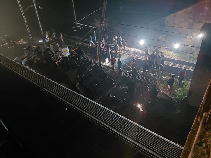 A dumper loaded with gravel broke the railing of a bridge and fell on the railway track in Barabanki.