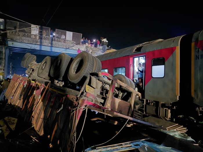 A dumper loaded with gravel broke the railing of a bridge and fell on the railway track in Barabanki.
