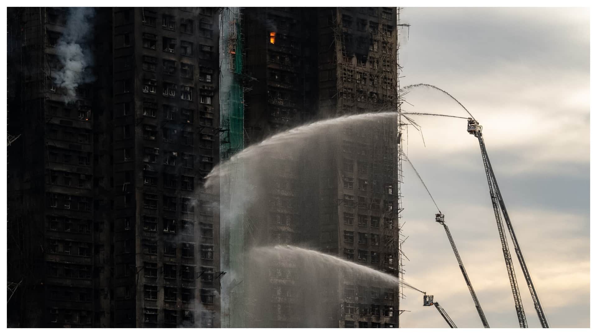 hong kong fire death toll hundreds of missing reason incident shocking photos images