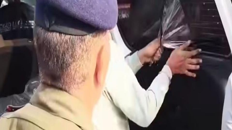 The police officer apologized for putting up a black film in rudrapur