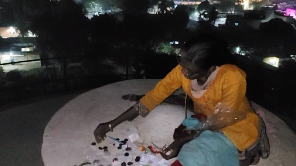 mentally disturbed woman sat on the water tank