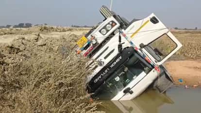 sand-laden dumper overturned in roadside ditch in chandauli