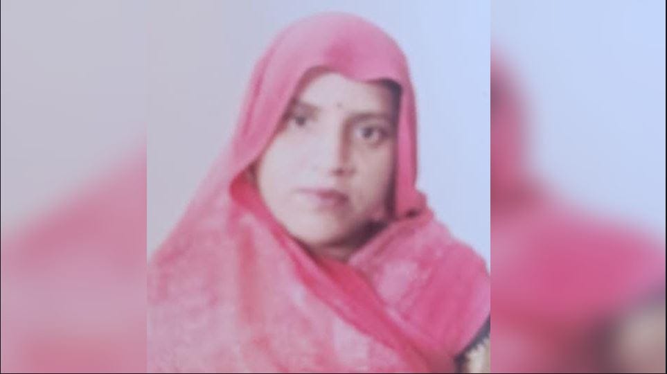 Woman dies after being buried under haystack
