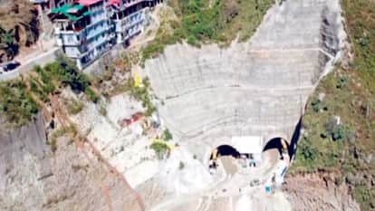 fourlane road was built on forest land, 120 metres outside the acquired land, a district administration invest