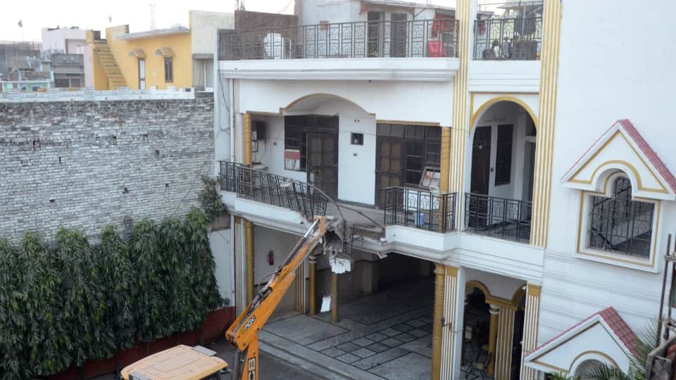 bda bulldozers ran on the marriage halls of SP leader for the second day in Bareilly