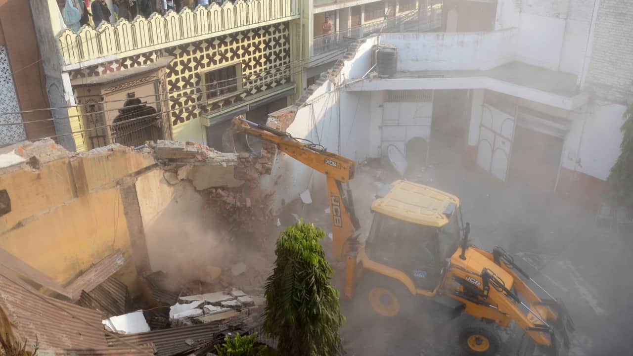 bda bulldozers ran on the marriage halls of SP leader for the second day in Bareilly