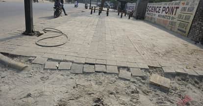 Kanpur CM Grid Scheme First tie a handkerchief around your mouth then walk on road dust flies day and night