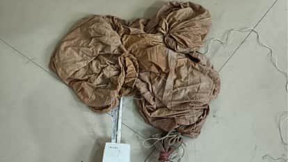 suspicious parachute-type device landed near Hisar airport, raising alarm among security agencies.