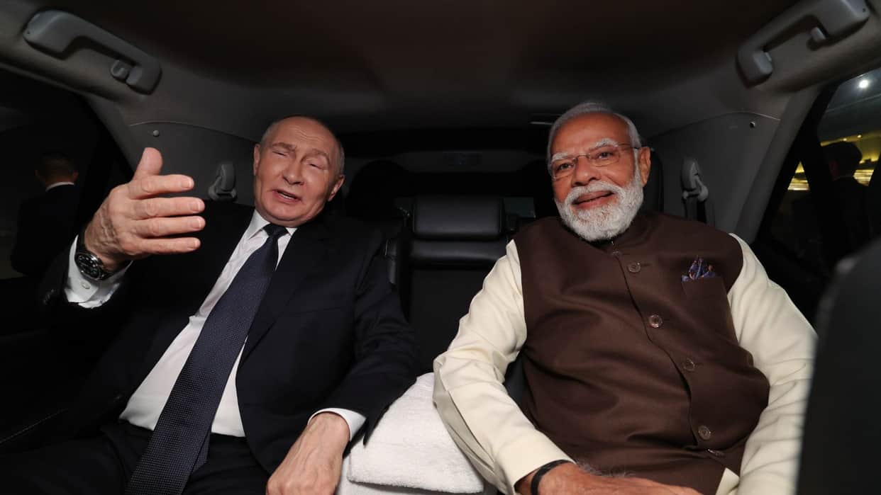 Putin India visit pm modi welcomes airport pmo pictures photos selfie in car