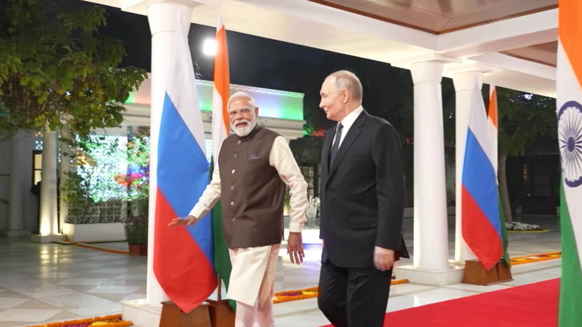 Putin India visit pm modi welcomes airport pmo pictures photos selfie in car