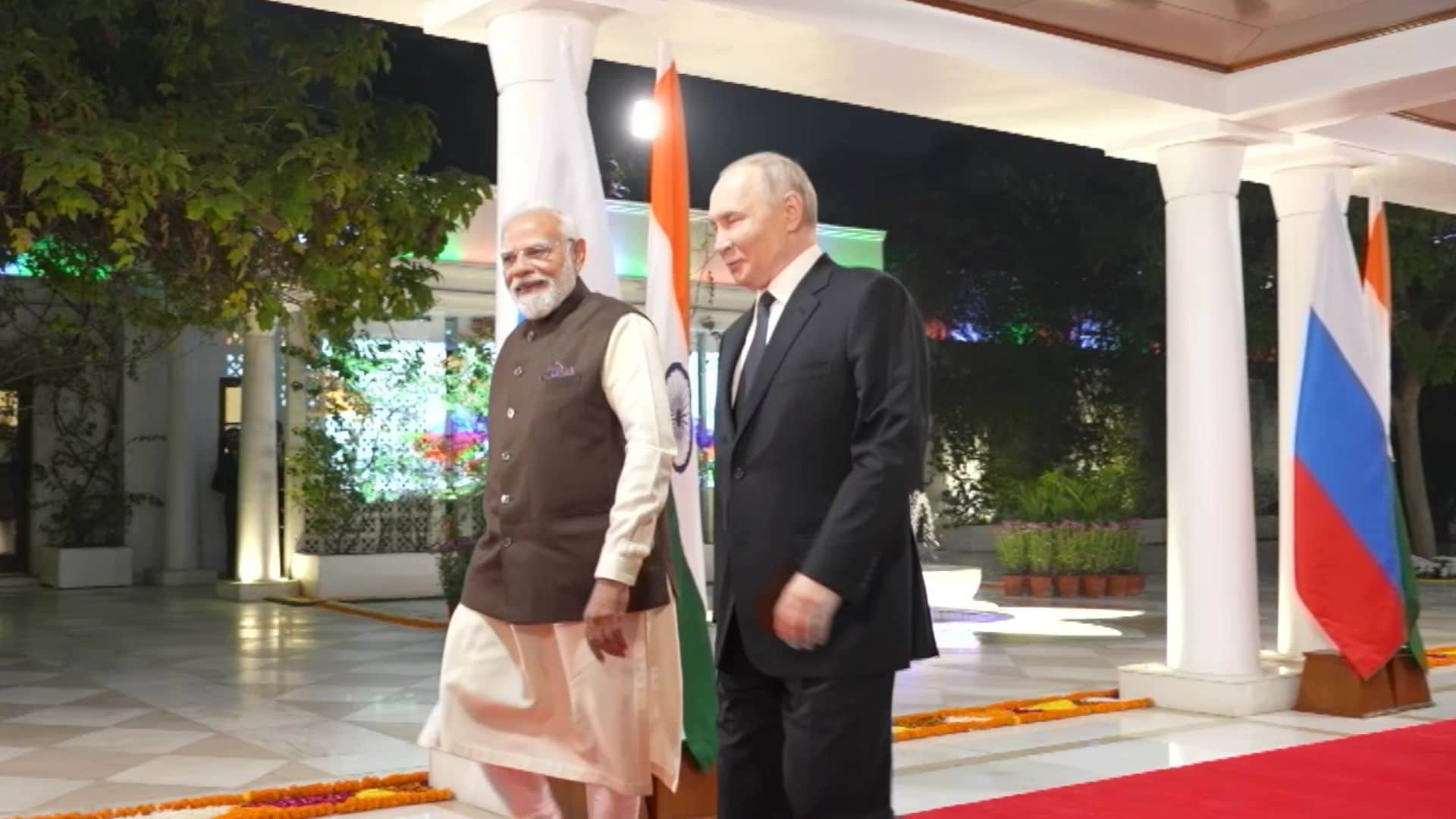 Putin India visit pm modi welcomes airport pmo pictures photos selfie in car