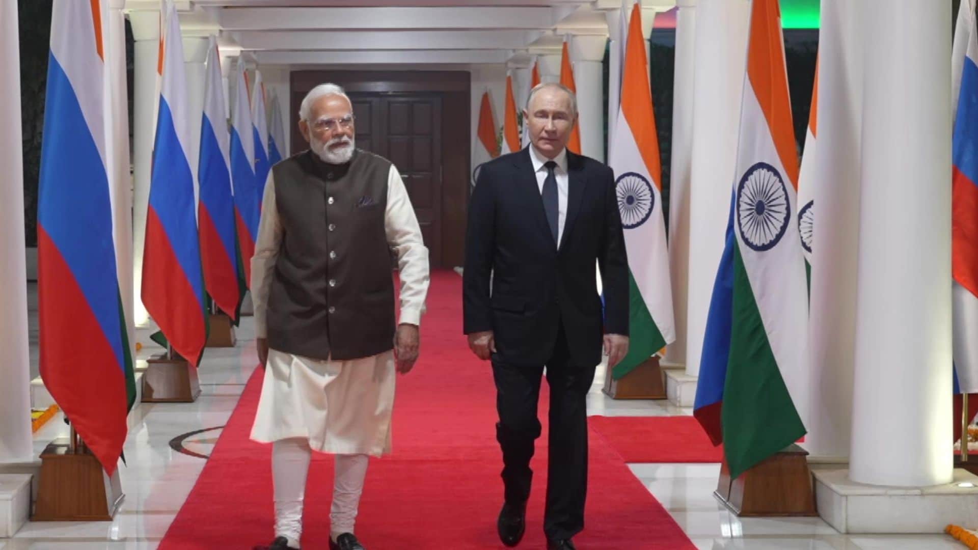 Putin India visit pm modi welcomes airport pmo pictures photos selfie in car