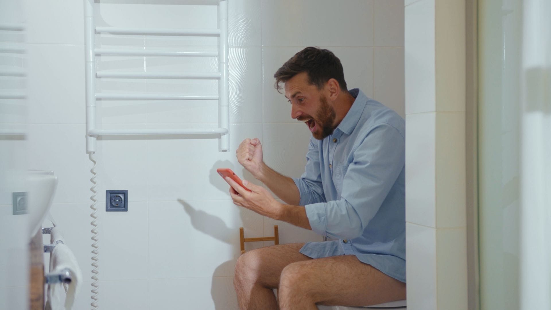 Using phone in toilet is bad for your health leading to hemorrhoids and bacterial infection