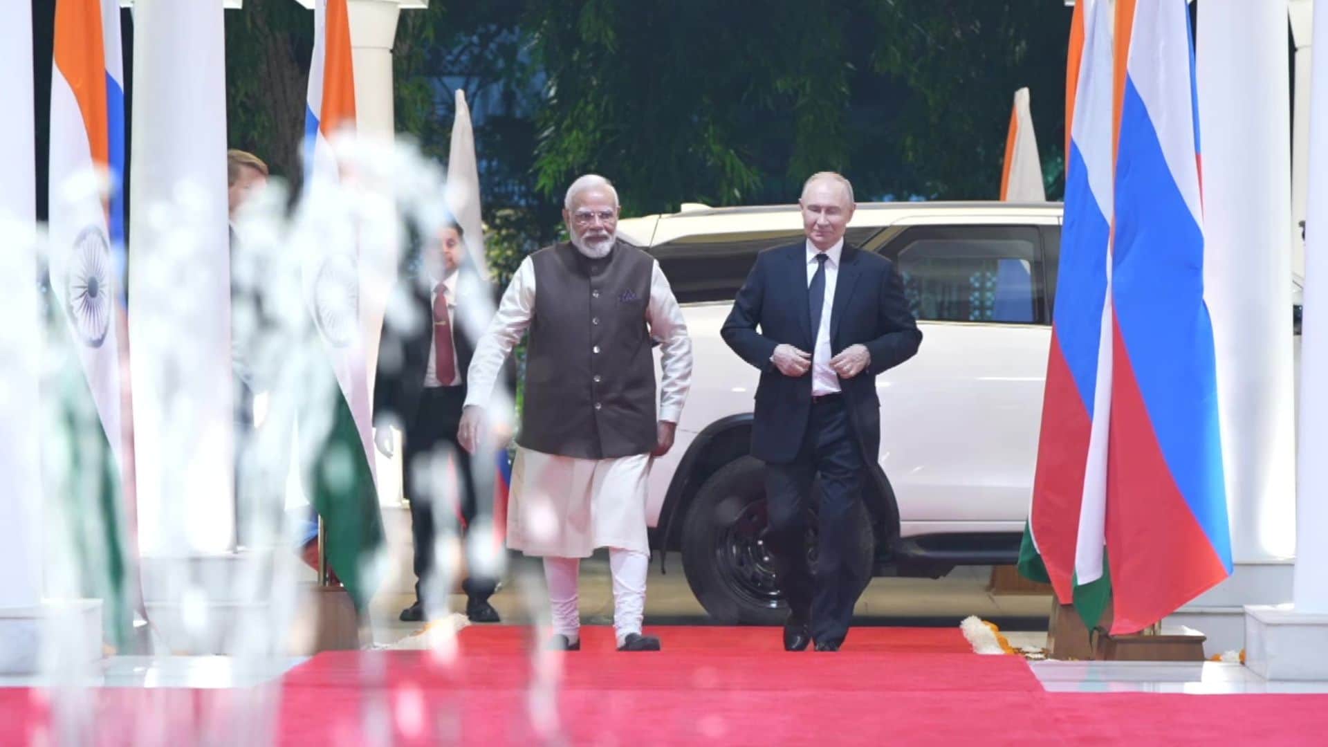 Putin India visit pm modi welcomes airport pmo pictures photos selfie in car