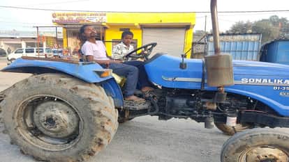 Drunk driver falls asleep while driving a tractor 10 year old boy takes control of the steering wheel in Balra