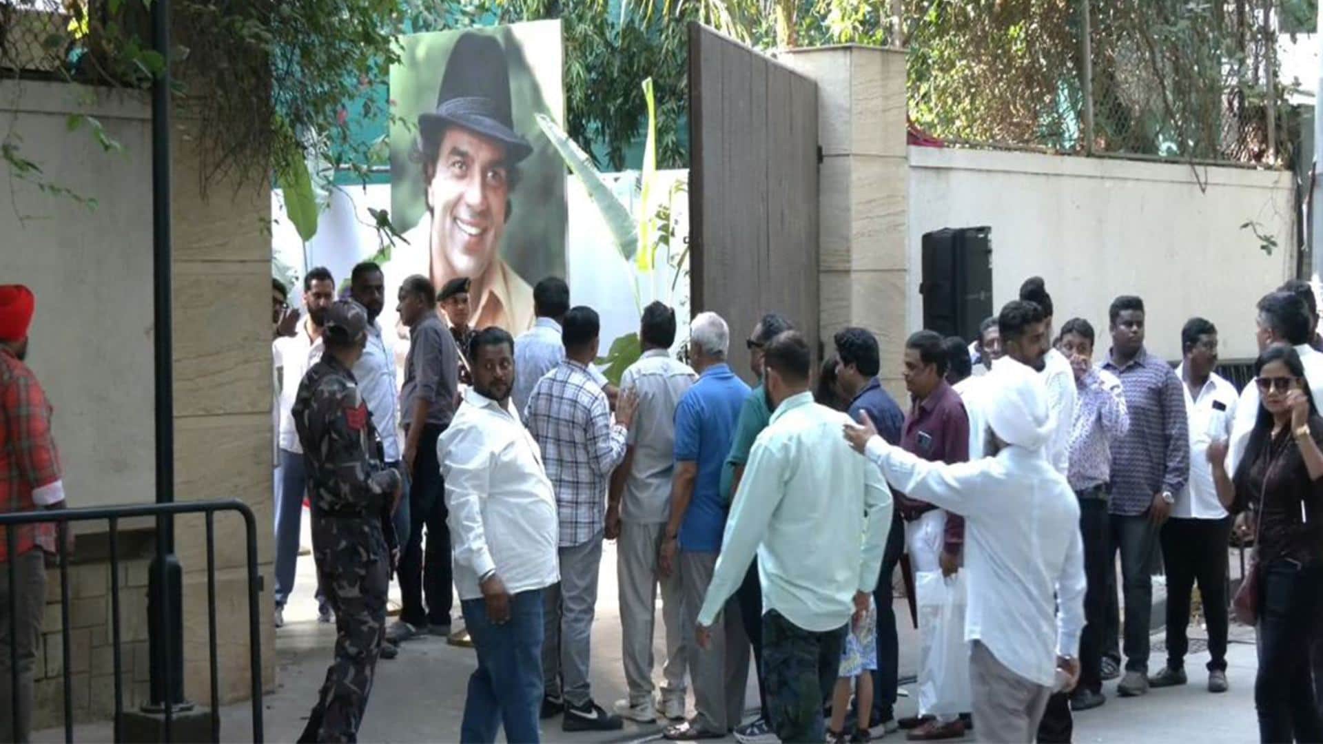 Fans gathered outside Dharmendras residence to celebrate late actors 90th birth anniversary