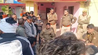 Police detained a contract worker his angry colleagues cut off the power supply to the police station and surr