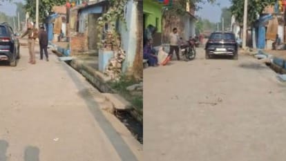 सड़क पर कार के पास खड़ा दरोगा