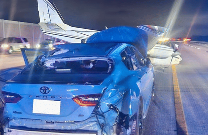 Light Aircraft crash land on Toyota Camry Car