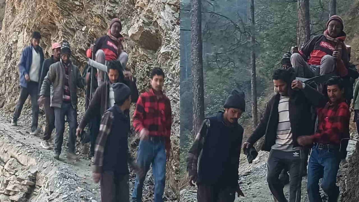 Sick person carried to hospital on a stretcher walking five kilometers on foot no road Dewal block Chamoli