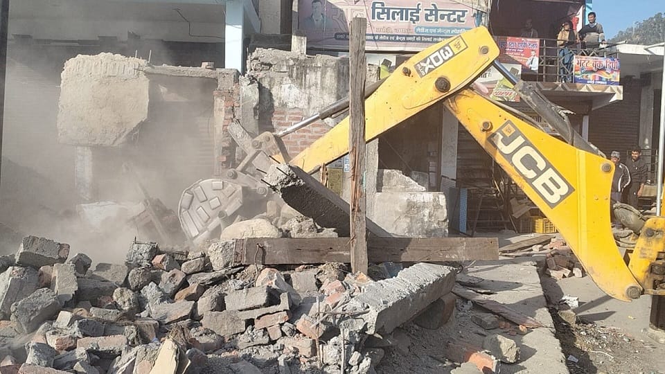 Three shops built illegally on government land were demolished in champawat
