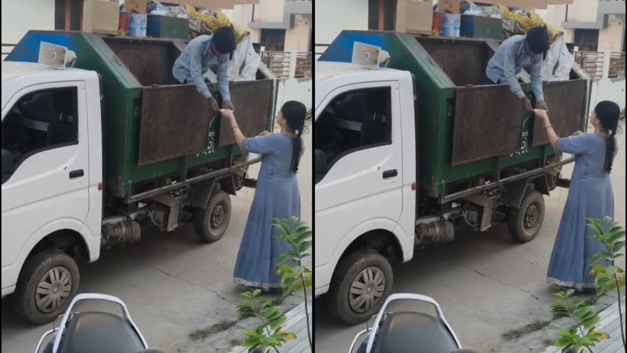 Woman becomes an example of humanity wins hearts by serving tea to a sanitation worker Video Viral