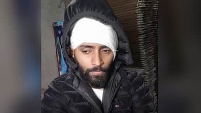 young man on motorcycle in Jalandhar half ear severed Chinese kite in jalandhar