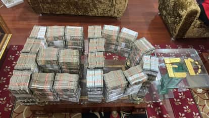 ED raids 13 locations of travel agents recovers Rs 4.68 crore in cash and gold and silver biscuits