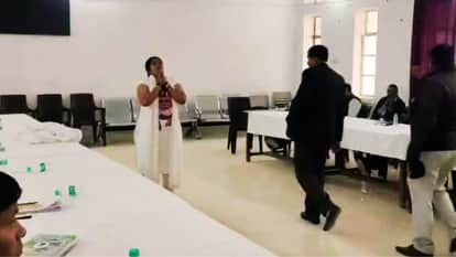 woman arrived at Tehsil Day event wearing clothes with PM Modi picture said Please get my land back