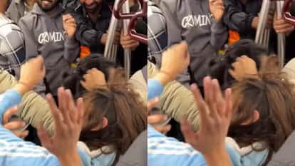 Two girls clash in Delhi Metro pull hair slap each other and kick each other video goes viral