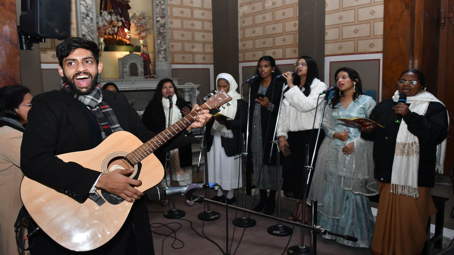 Happy Christmas: Church bells ring during midnight service, churches illuminated with candlelight