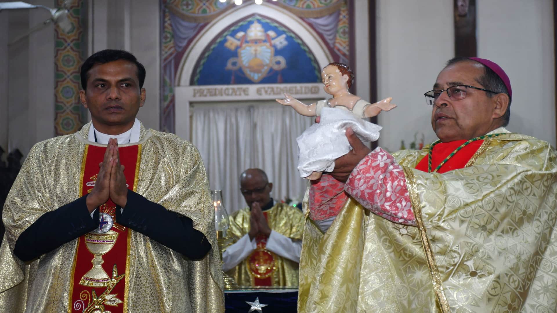 Happy Christmas: Church bells ring during midnight service, churches illuminated with candlelight
